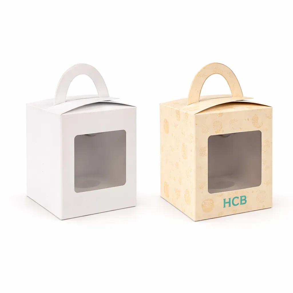 Two gabled bakery carrier boxes with handles, one plain white and one featuring teal wave branding. class=